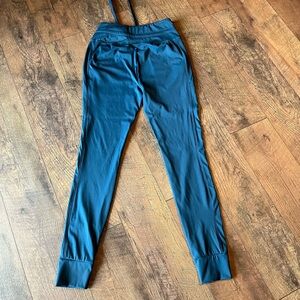 Halara Teal High-Waisted joggers.